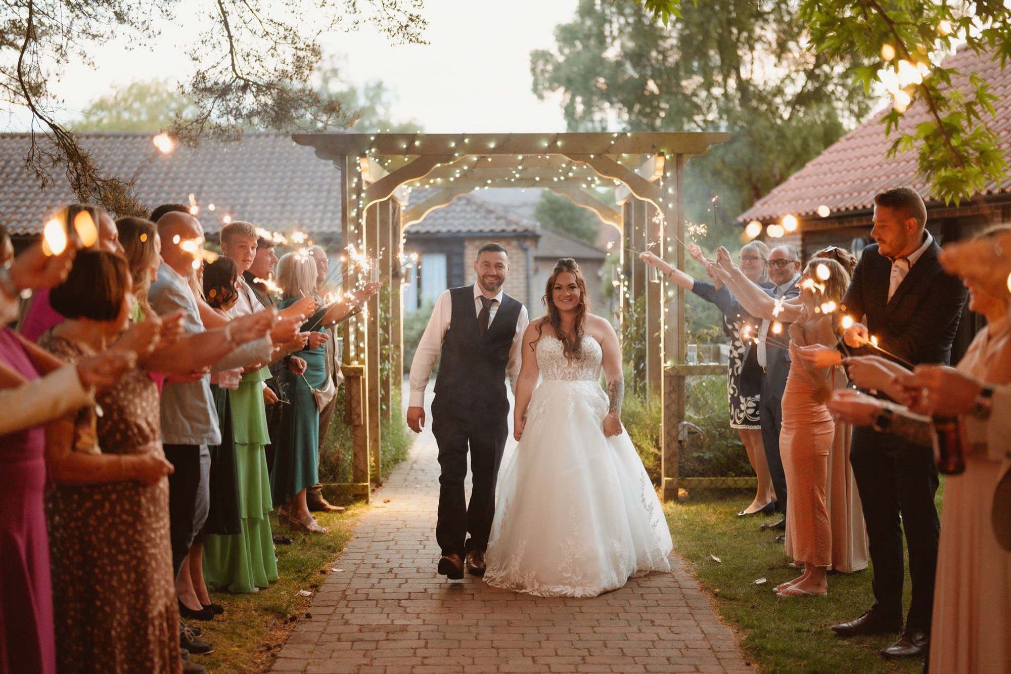 A couple in the gardens at golden hour