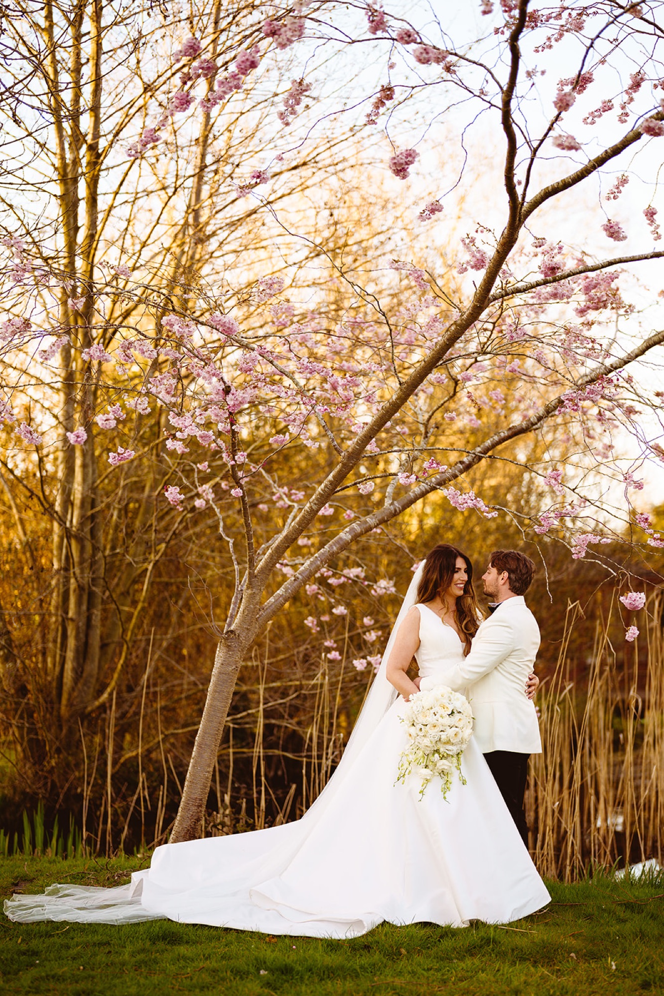 A couple beside the water