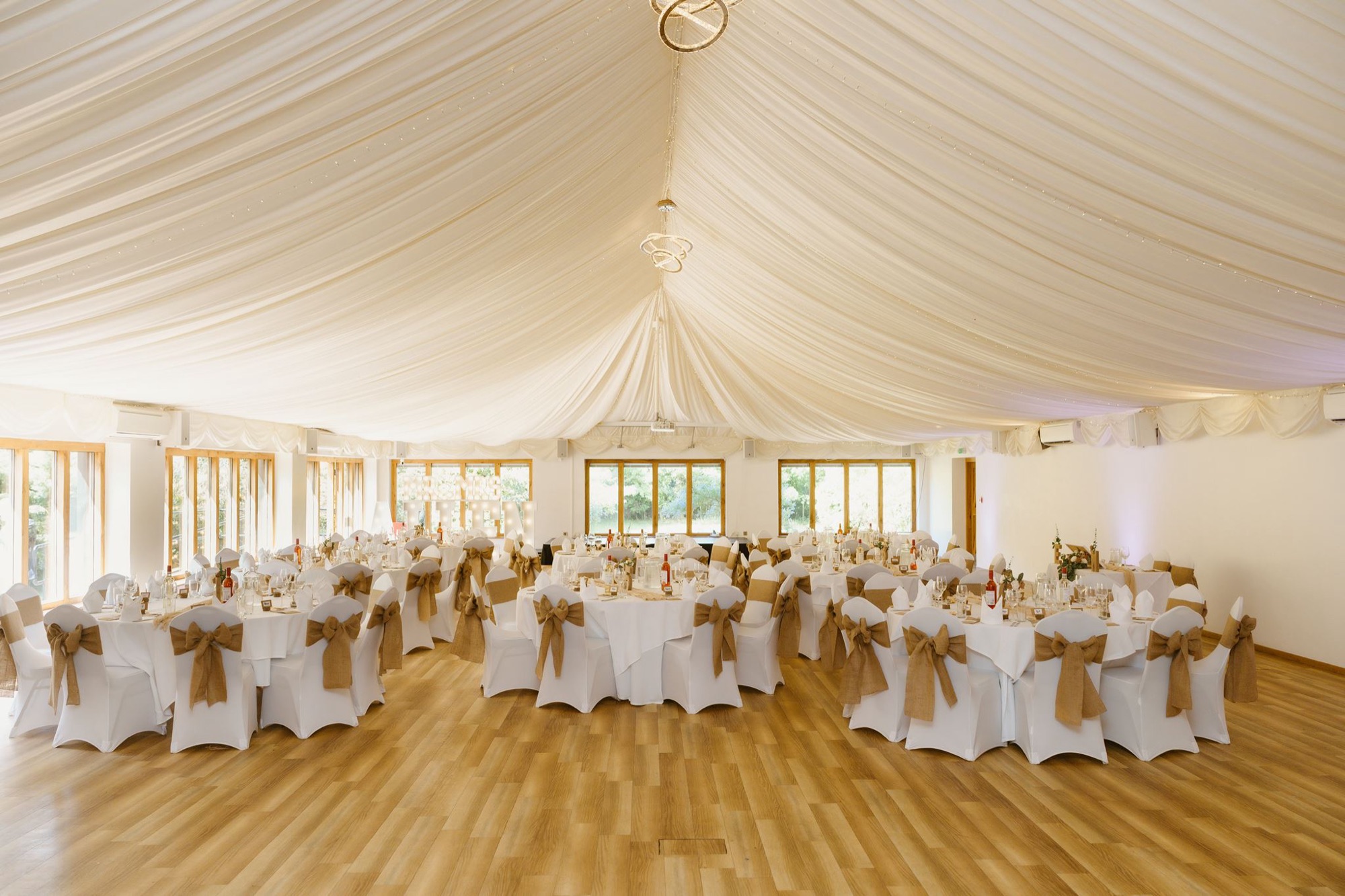 Ivy Hall dressed for a grand reception beneath a canopy of fairy lights